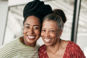 two women are smiling in the picture