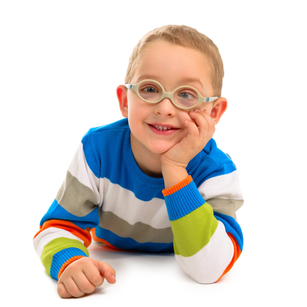 Portrait of cute smiling boy with glasses on a white background