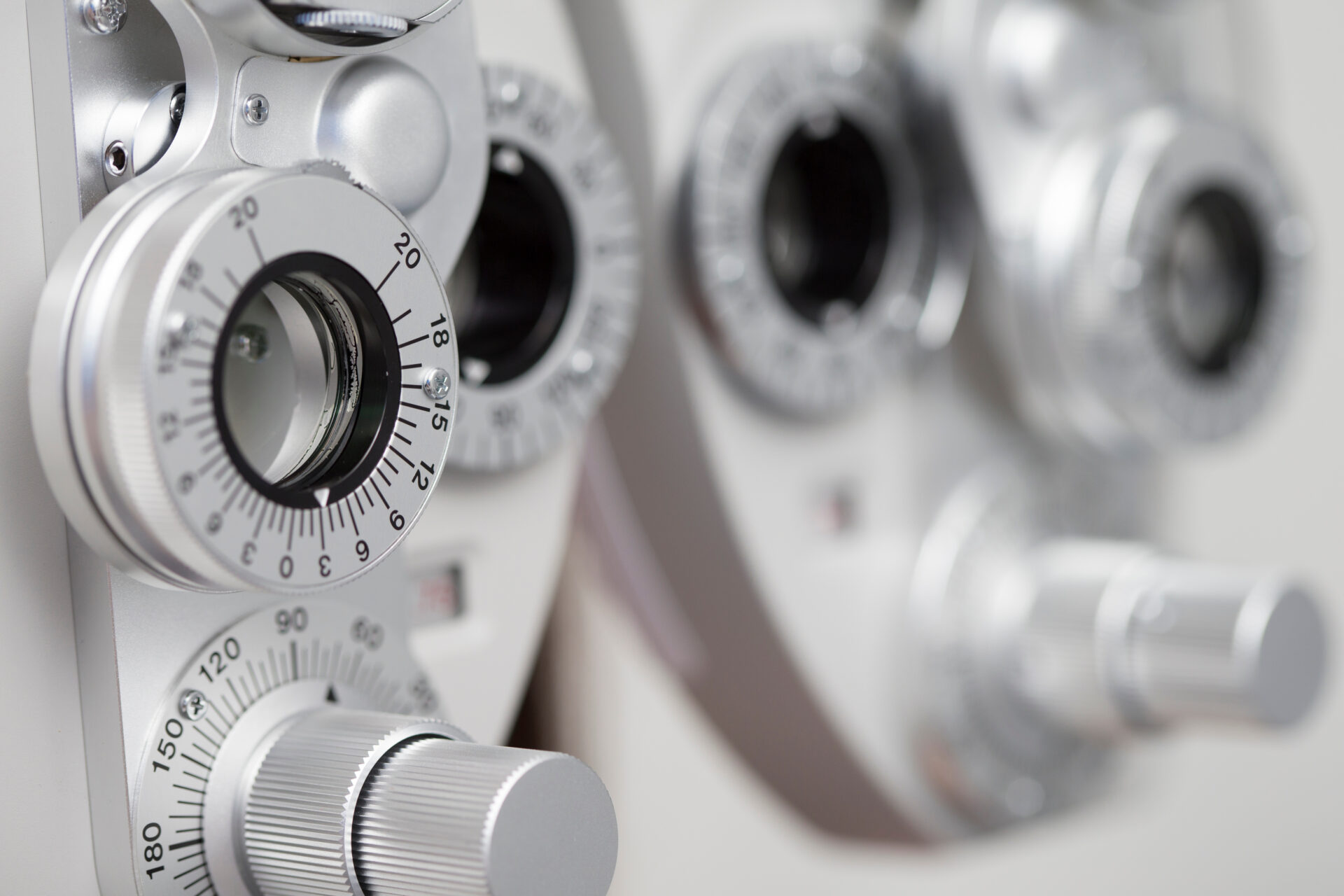 Closeup of a phoropter in an optometrist's office.